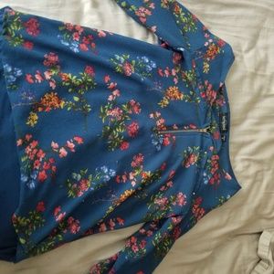 A half sleeved floral kids shirt